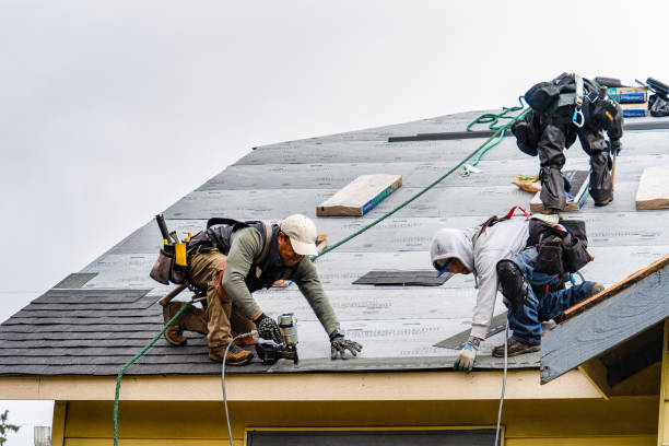 Professional Roofing technician working in Corona, CA